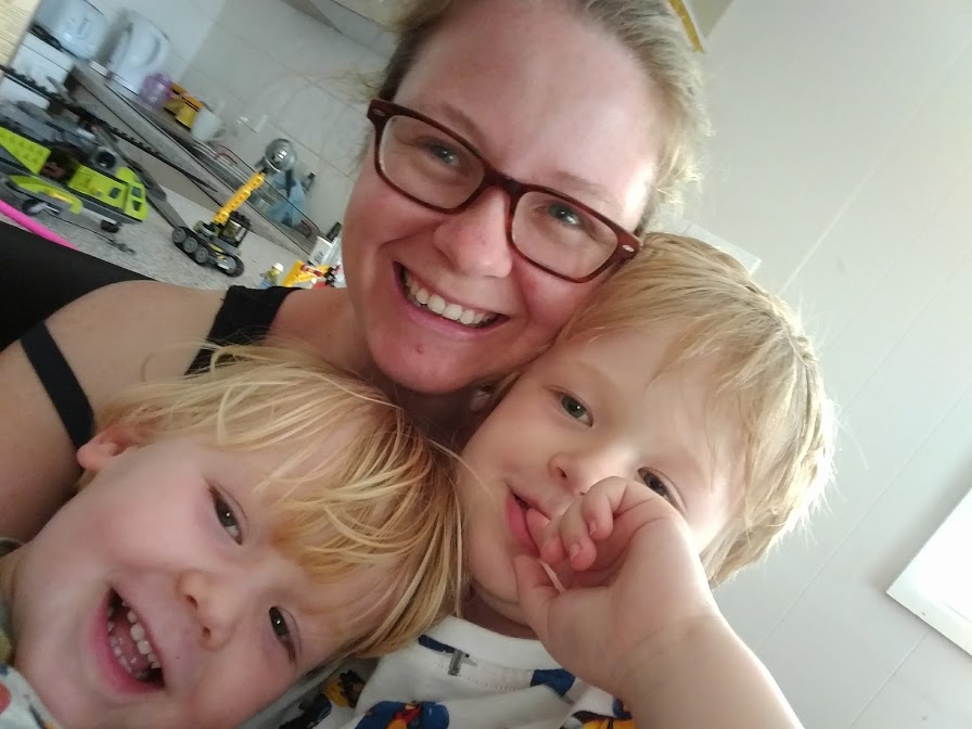 Happy mom with two boys